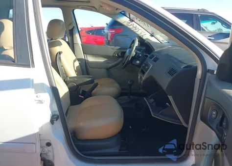 2006 Ford Focus Zx5 z USA, uszkodzony, nr VIN 1FAHP37N36W143201